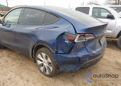 2023 Tesla Model Y Awd/Long Range Dual Motor All-Wheel Drive z USA, uszkodzony, nr VIN 7SAYGDEE1PA189618